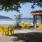 Condomínio Brisa da Praia - Casas com 2 dormitórios, churrasqueira privativa e 3 vagas de garagem